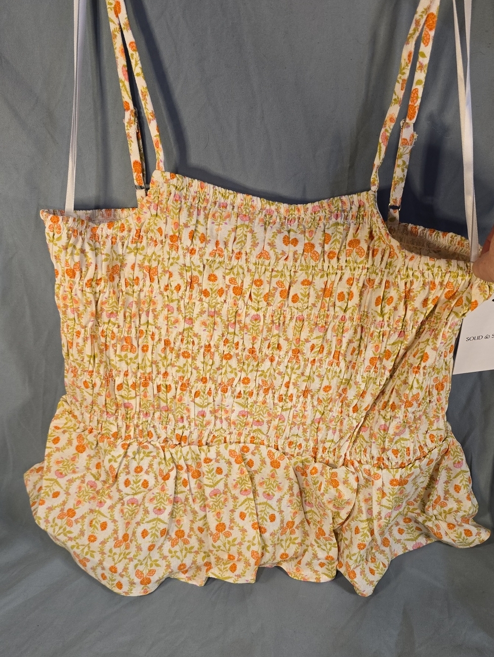 SOLID & STRIPED Cream Floral Smocked Cami with Ruffle Hem and Adjustable Straps